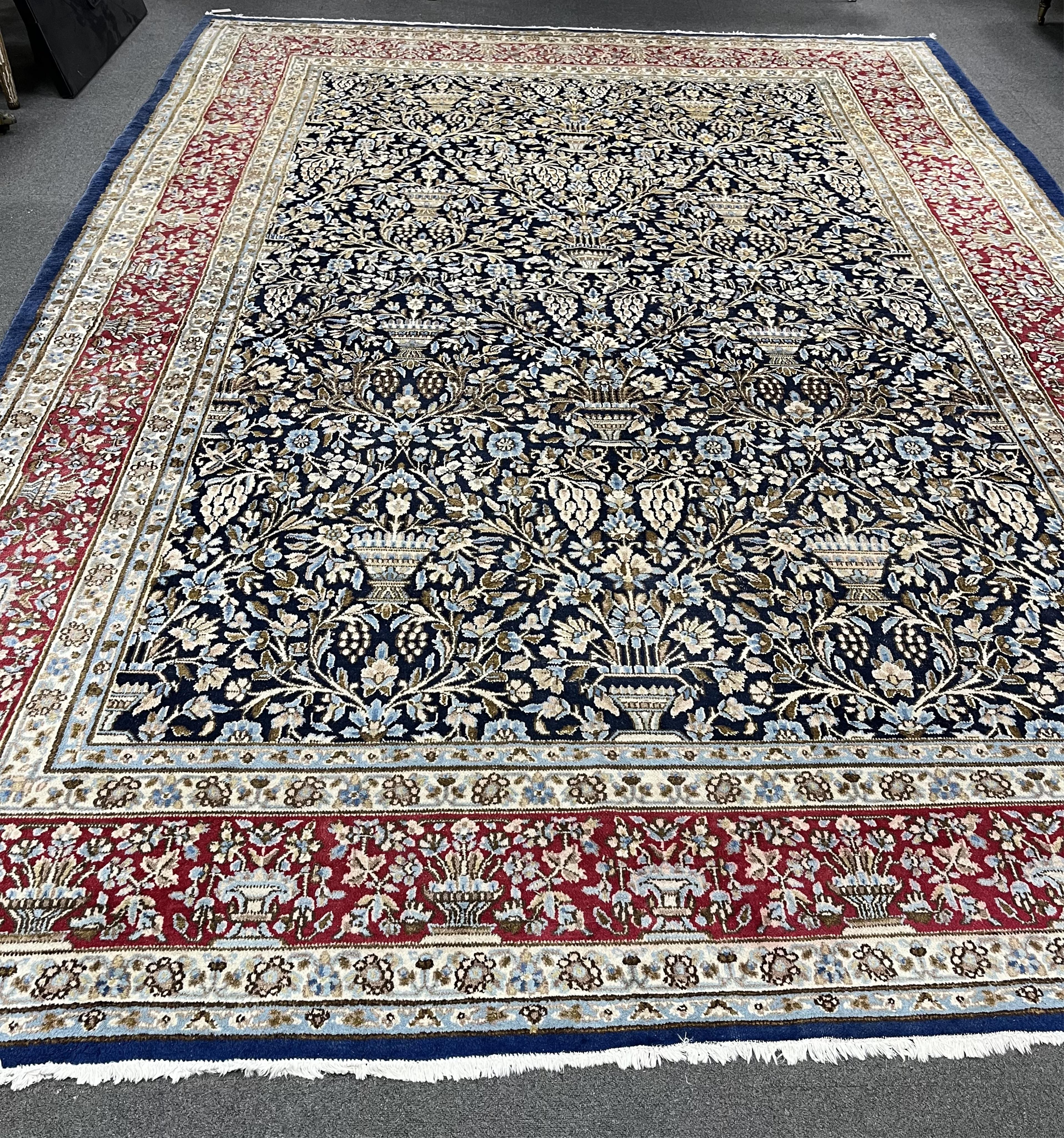 A North West Persian blue ground carpet, 394 x 284cm. Condition - good